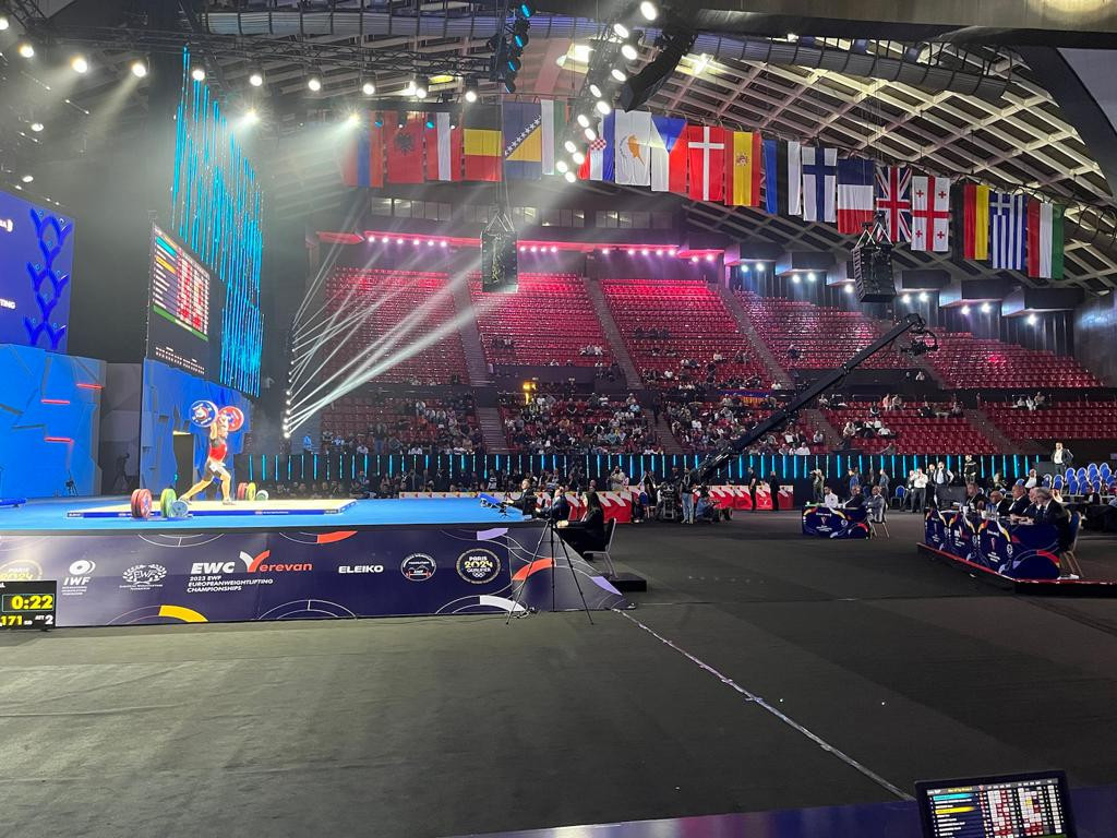 Flags of the competing nations are displayed in the arena during the European Weightlifting Championships in Armenia ©Brian Oliver