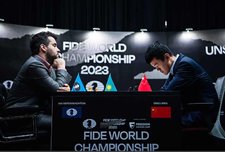 Pressure is building on China's Ding Liren, right, as he trails Russian Ian Nepomniachtchi in the FIDE World Championship match with just three games remaining ©FIDE