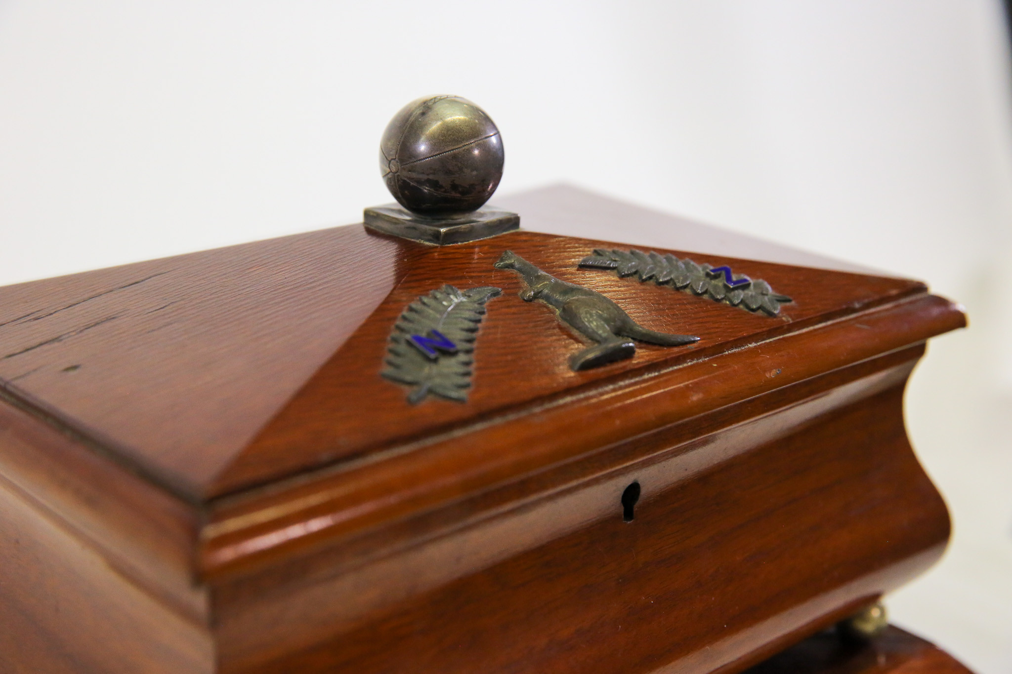 The case of the casket depicts the emblems of both New Zealand and Australia ©Football Australia