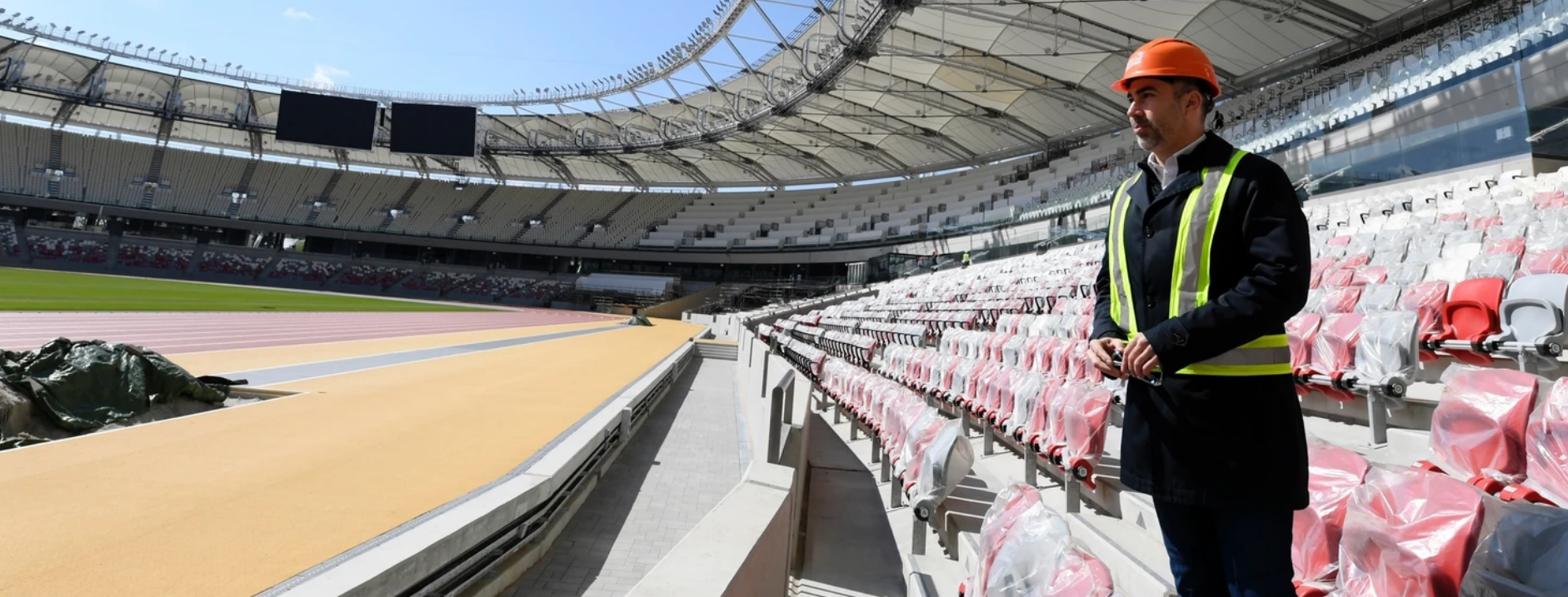 Marton Gyulai, deputy general manager of Budapest 2023, surveys the newly-finished nine-lane track at the National Athletics Centre ©Budapest 2023
