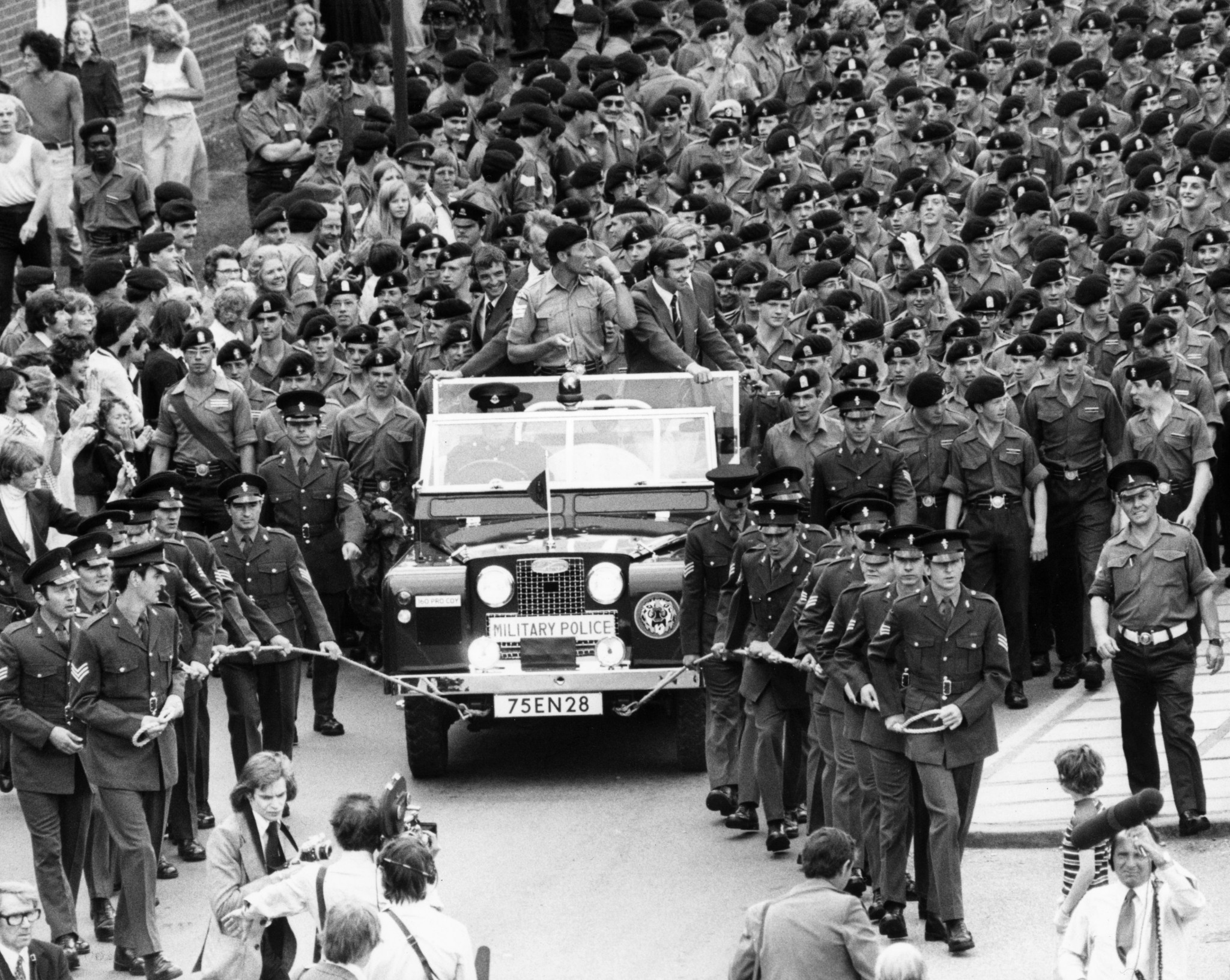 Soldiers pulled a landrover carrying Jim Fox and his gold medal winning teammates during their victory procession in 1976 ©Getty Images