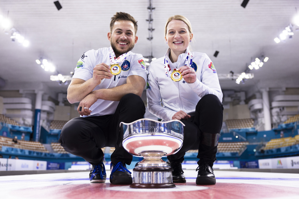 Korey Dropkin, left, and Cory Thiesse, right, became the first American winners of the World Mixed Doubles Curling Championship ©WCF/Stephen Fisher