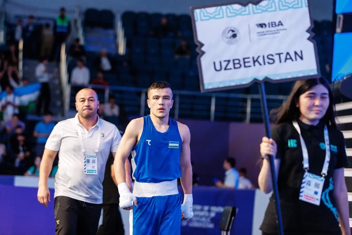 Mujibillo Tursunov of Uzbekistan progressed when an RSC decision was made during his bout against Marry Corr of Gambia ©IBA
