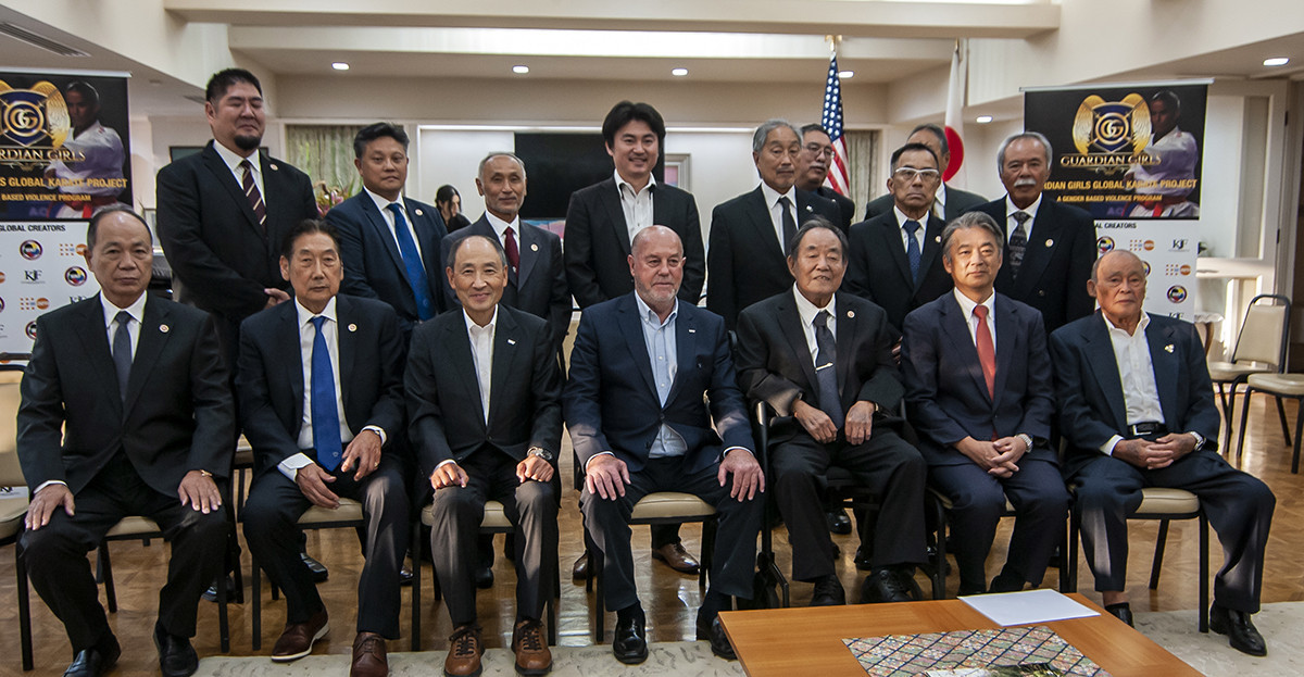 Fumio Demura, pictured last November, seated third from right, with WKF President Antonio Espinós, seated centre, at a meeting in Los Angeles ©WKF