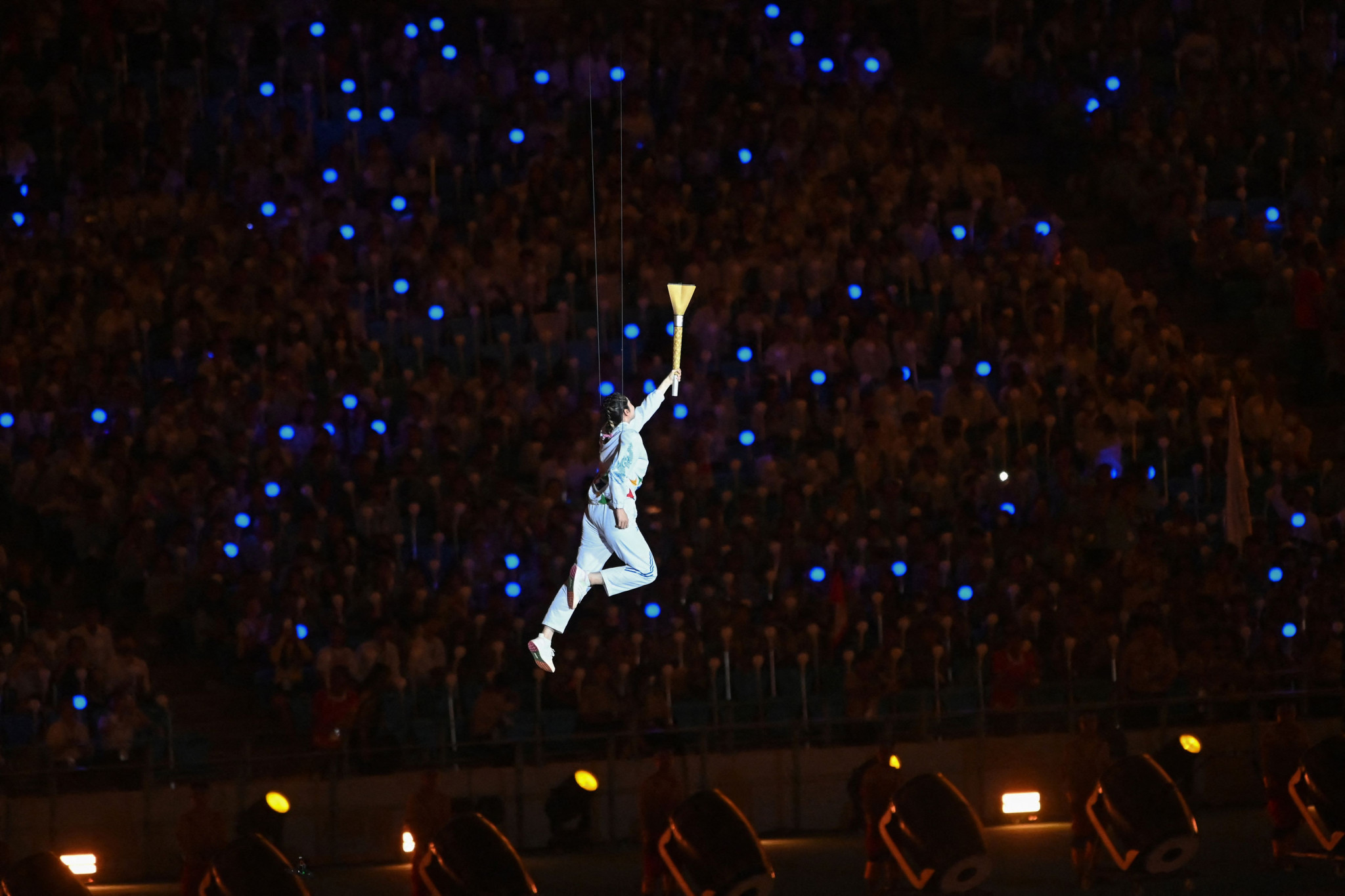 Cambodia's three-time Southeast Asian Games taekwondo gold medallist Sorn Seavmey flew through the air on her way to lighting the Cauldron at the Opening Ceremony ©Getty Images