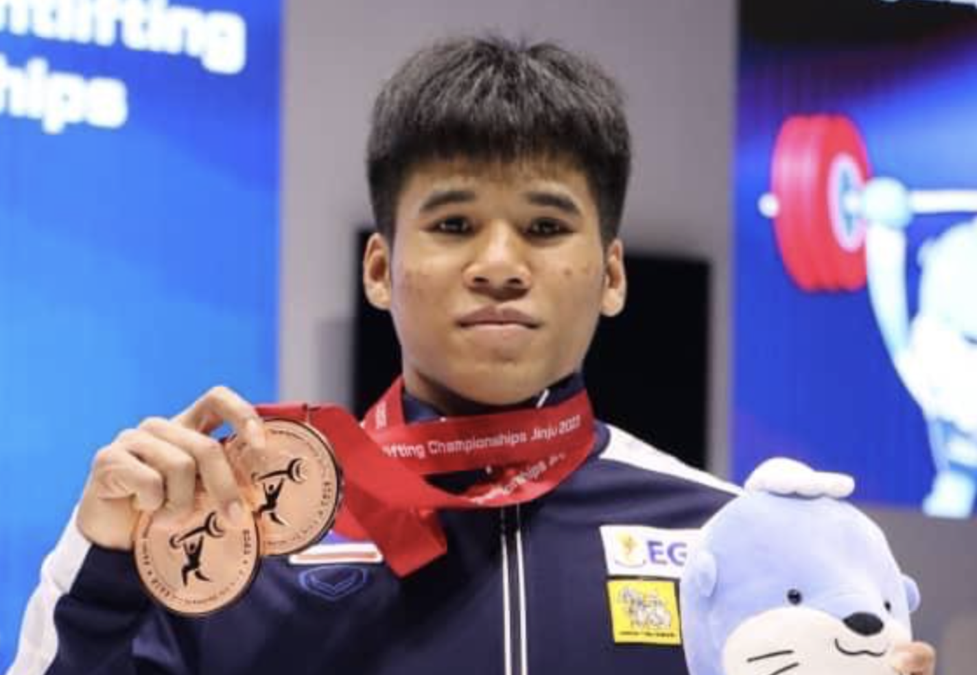 Thai teenager Therapong Silachai with his medals ©Brian Oliver