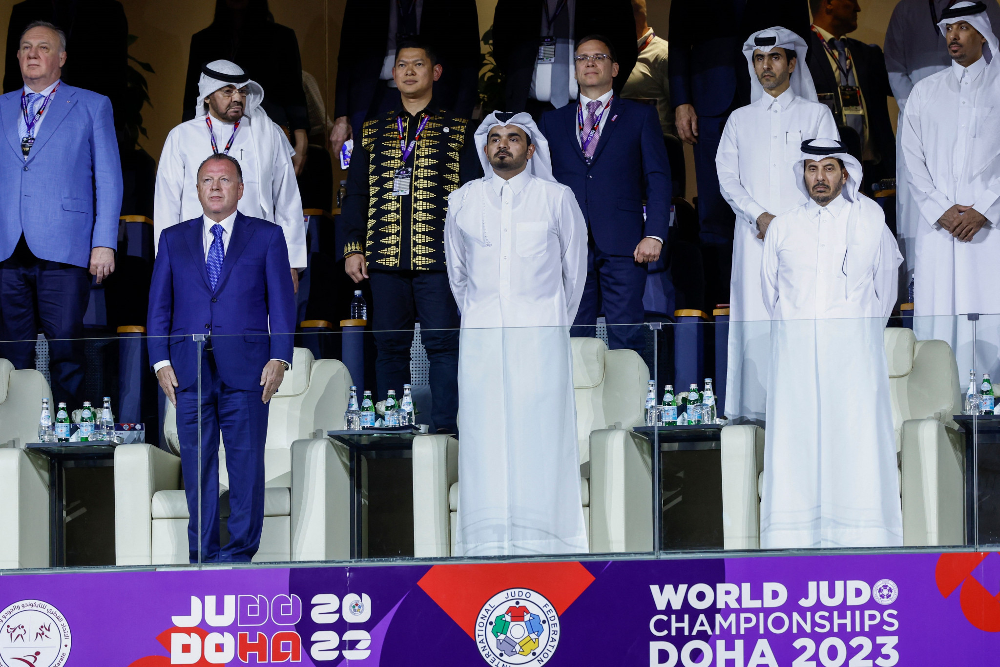 IJF President Marius Vizer, left, stands next to Qatar Olympic Committee leader Sheikh Joaan bin Hamad Al-Thani, centre, at the Opening Ceremony where he praised Doha's hosting of major events ©Getty Images