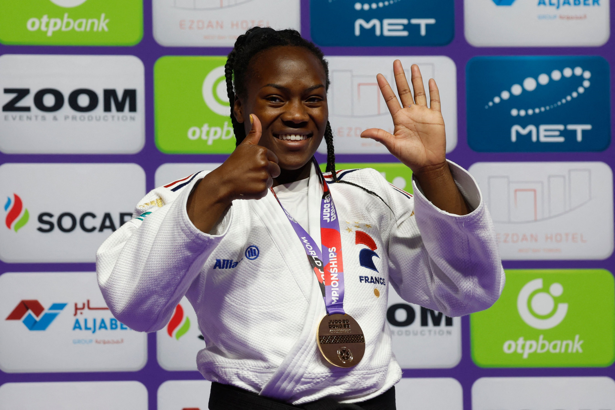 France's Clarisse Agbégnénou celebrates winning her sixth individual world title in Doha ©Getty Images
