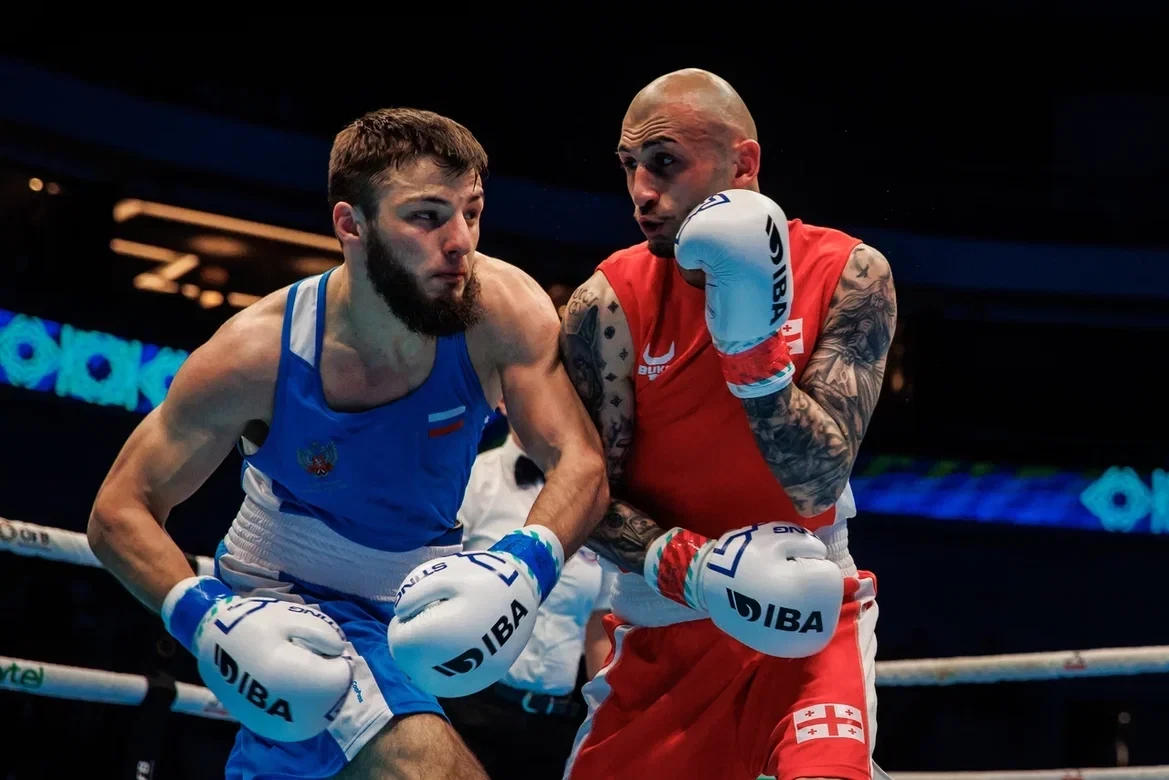 Number one seed Lasha Guruli of Georgia, right, got the better of Tarkhan Idigov of Russia in the welterweight class ©IBA