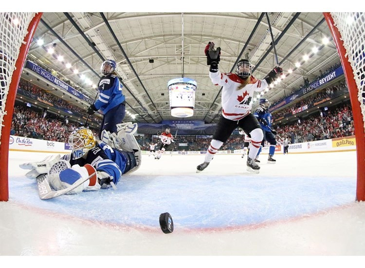 Natalie Spooner netted a hat-trick as Canada reached the final with a 5-3 win over Finland