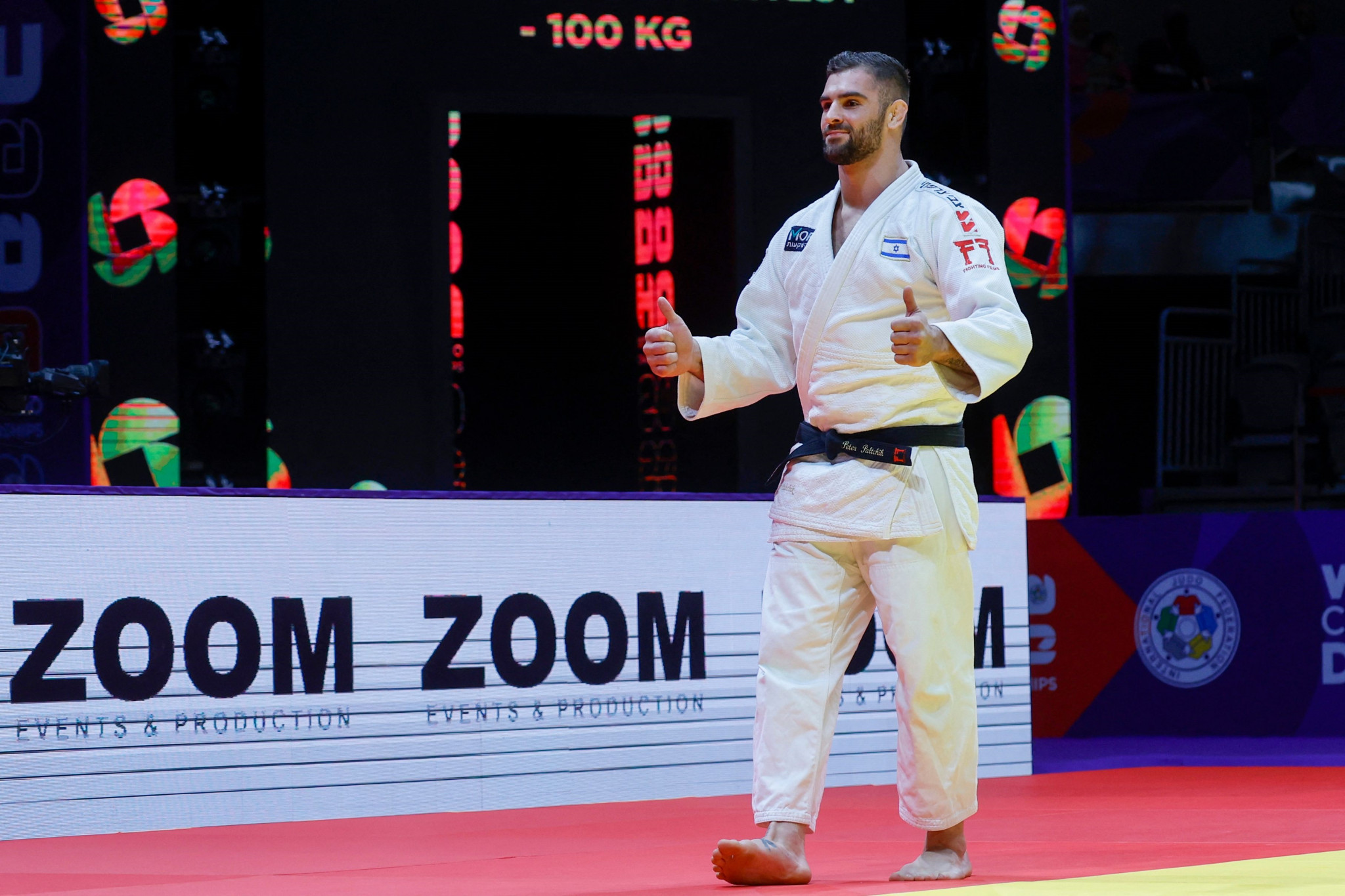 Israel's Peter Paltchik also gives the thumbs up as he won bronze after Canada's Shady El Nahas was unable to fight him due to injury ©Getty Images