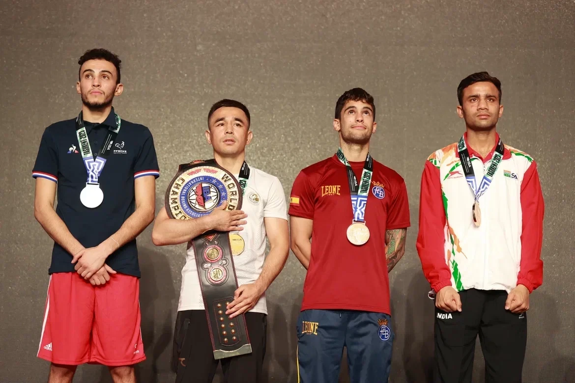 Hasanboy Dusmatov of Uzbekistan, second from left, won the flyweight title ©IBA