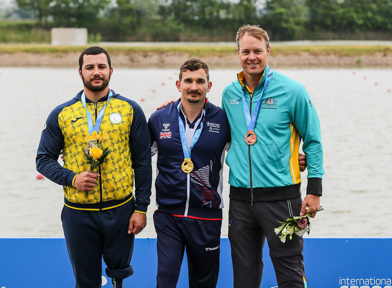 Cancer survivor Stuart Wood of Britain, centre, sealed an emotional return to racing as he won the VL3 Para canoe event ©British Canoeing