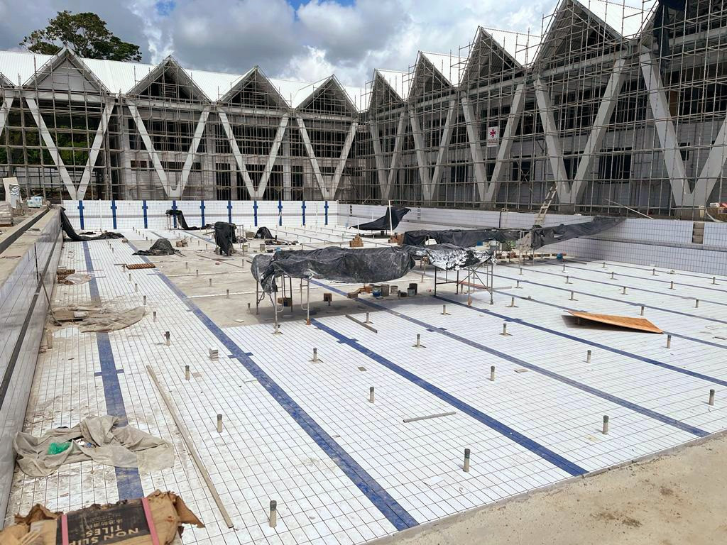 Work is under way on the floor of the swimming pool at Sports City ©Sol2023