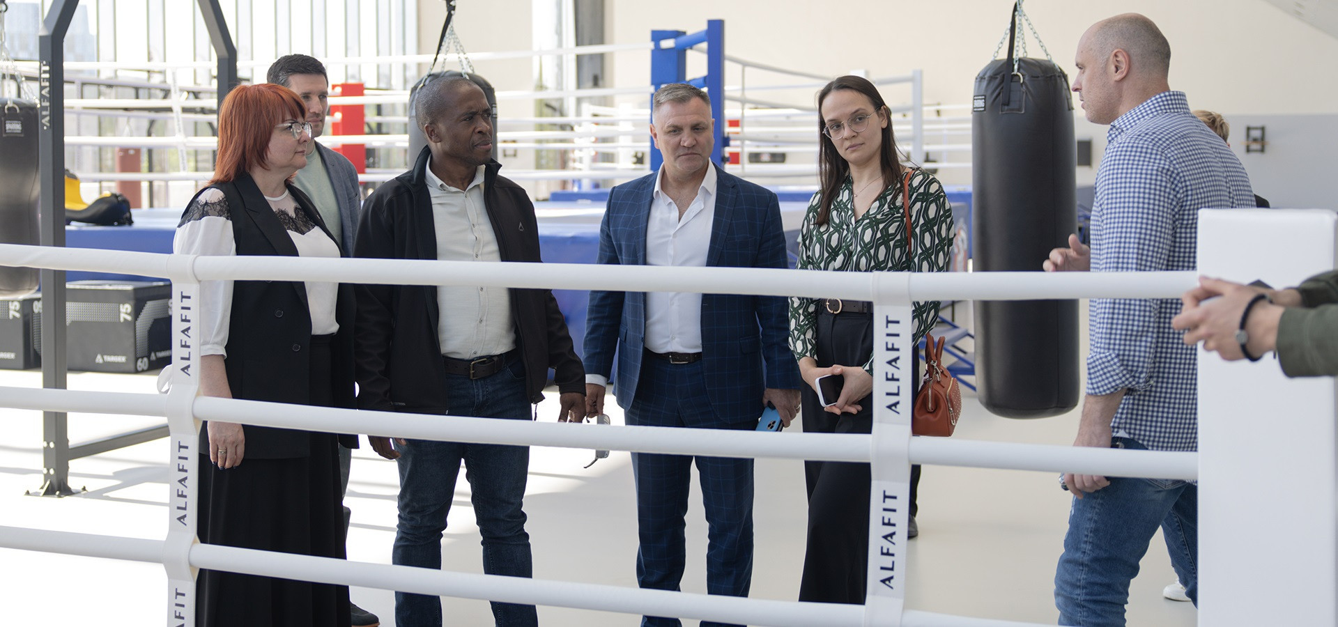 SANABO President Siyabulelo Mkvale, second from left, was given a tour of the International Boxing Center in Luzknik ©RBF