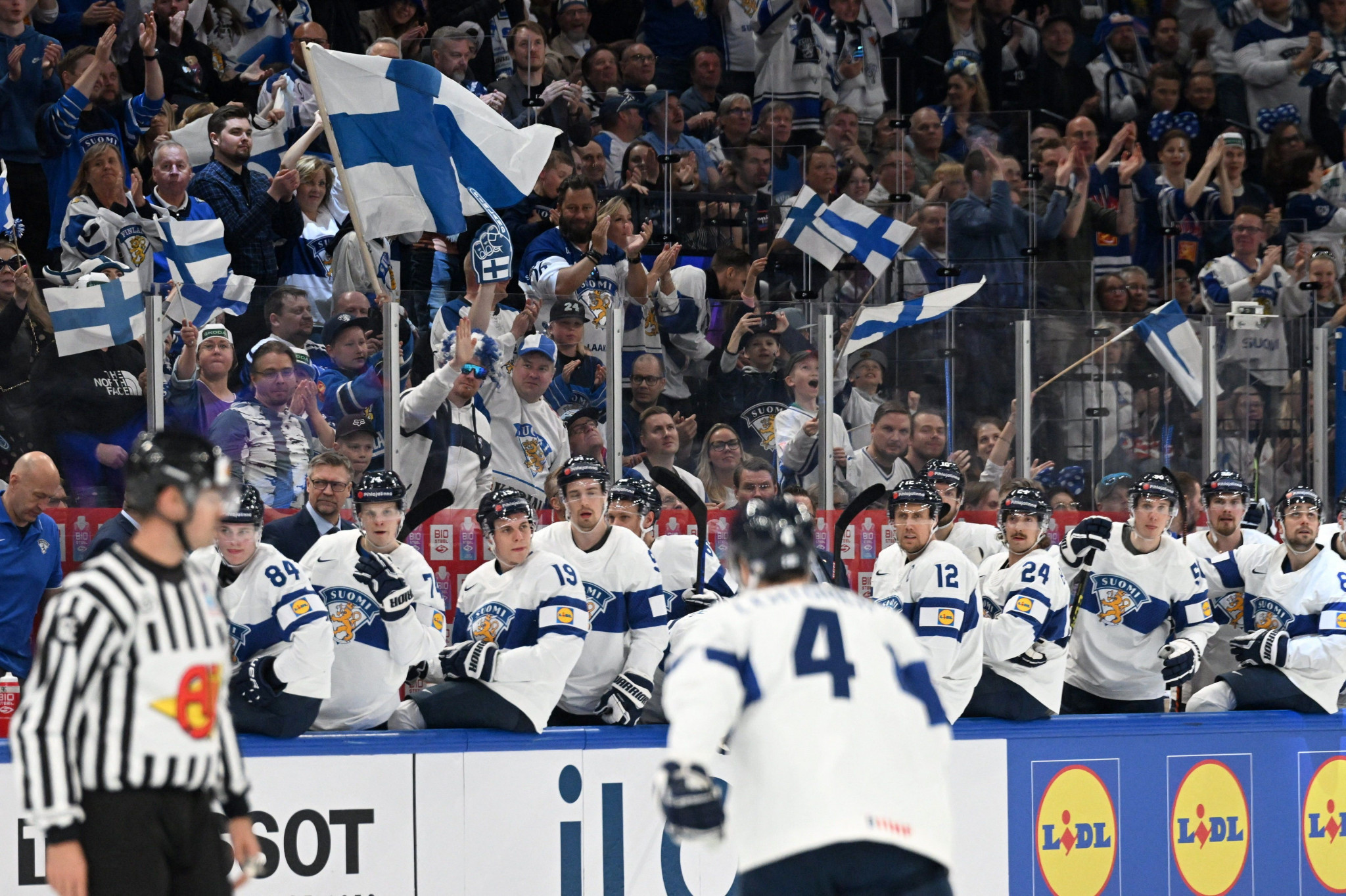 Finnish fans celebrate during their team's 7-1 thrashing of Hungary in Tampere ©Getty Images