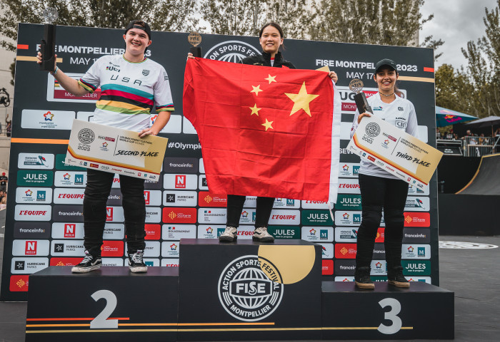 Zhou Hui Min, centre, produced an upset to win BMX freestyle gold at FISE Montpellier ©Hurricane-FISE