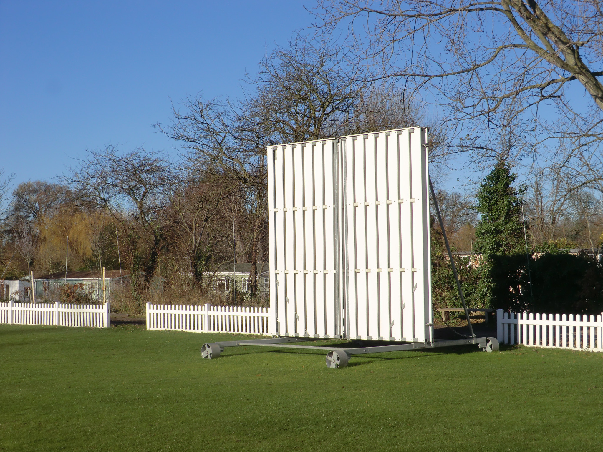 Trees behind the sightscreen at East Molesey added to the problems of those attempting to hit a ball out onto the island behind©ITG