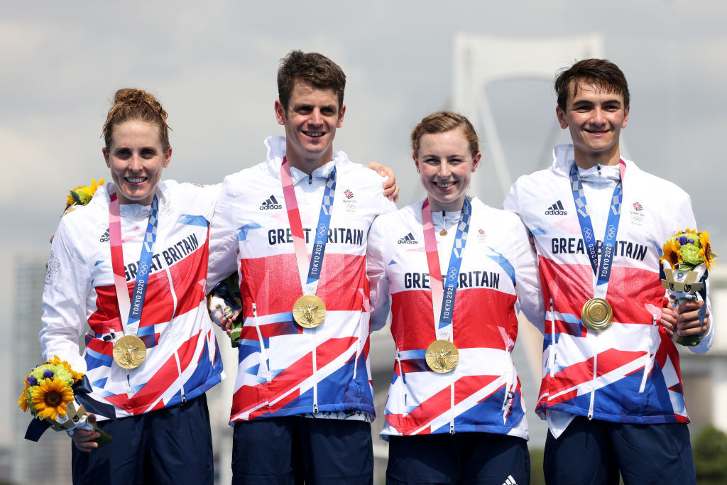 Jonny Brownlee, second left, completed his Olympic triathlon medal set by taking gold as part of Britain's mixed relay team at the Tokyo 2020 Games ©Getty Images