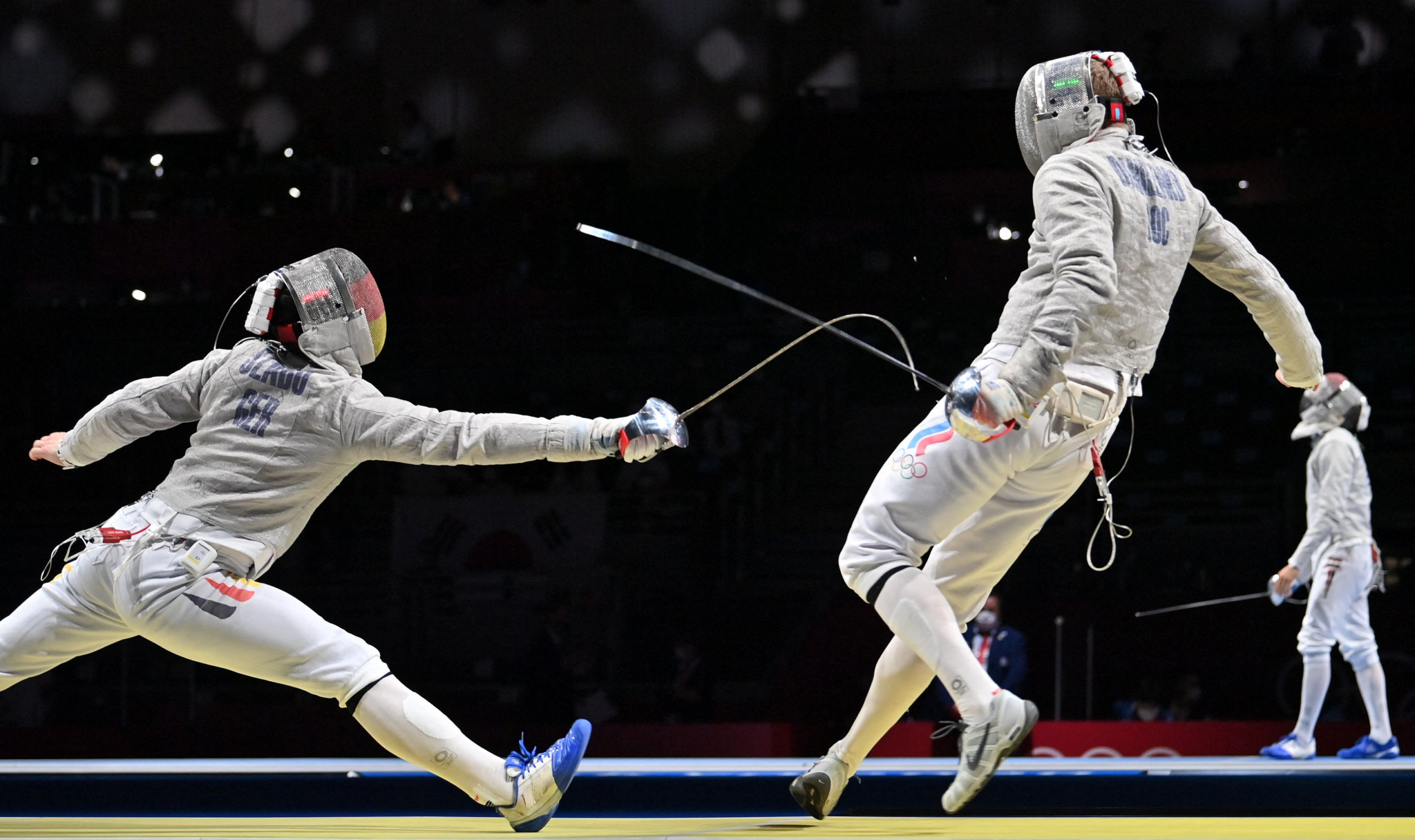 Russian fencer Dmitriy Danilenko, right, has turned down the opportunity to compete as a neutral at FIE events ©Getty Images