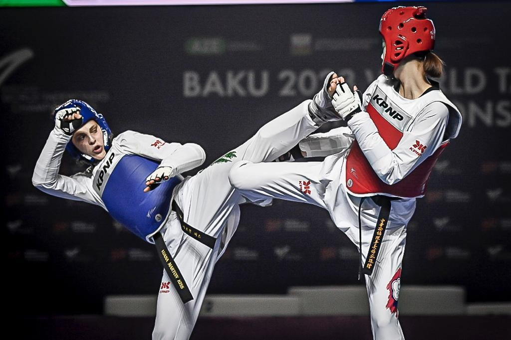 Hungary's Luana Márton, left, forced Chinese Taipei's Lo Chia-ling, right, to settle for a second consecutive World Championships silver at women's under-57kg ©World Taekwondo