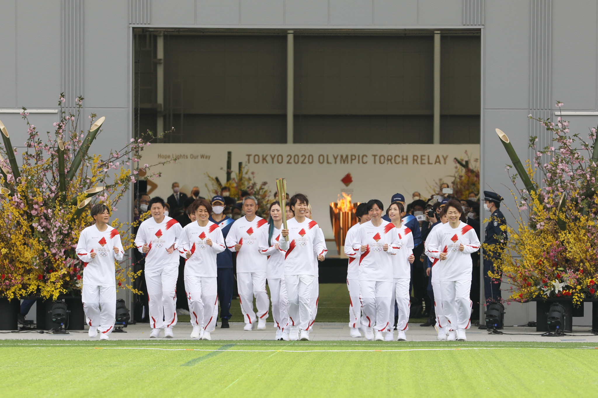 Teams of runners are to be invited to carry the Flame in similar fashion to the Japanese football team which began the Tokyo Torch Relay ©Getty Images