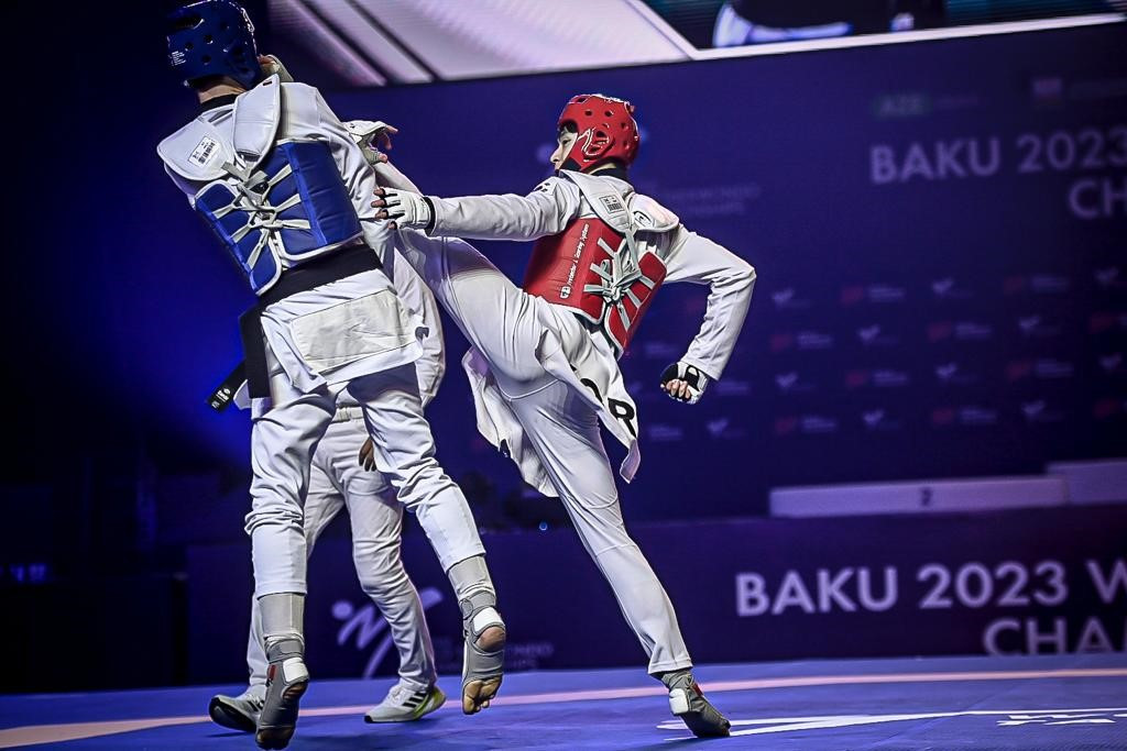 Georgii Gurtsiev, left, was the first Belarusian neutral to reach a final at the World Championships, but Bae, right, proved too strong ©World Taekwondo