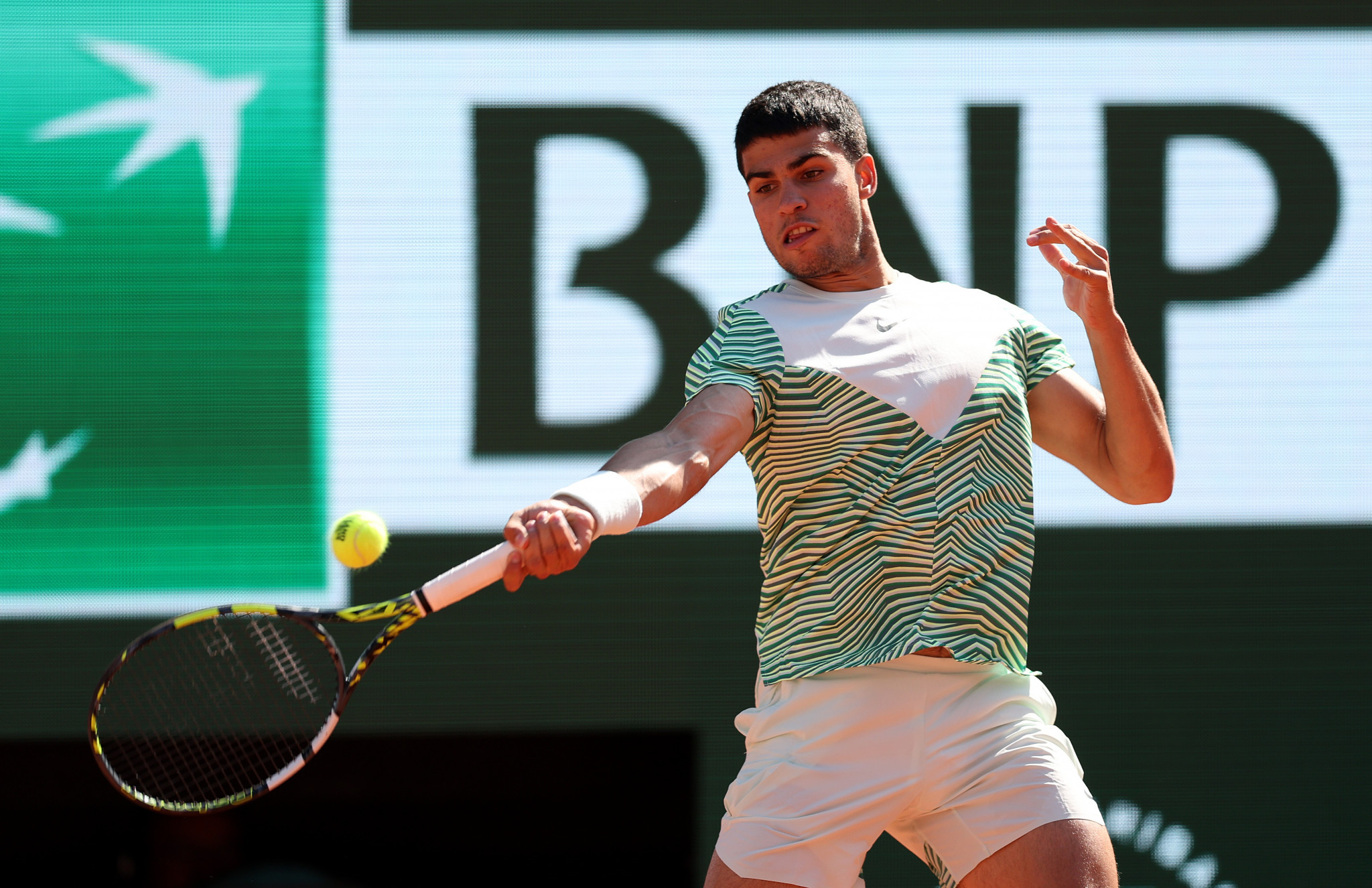 Alcaraz and Djokovic march on at French Open as home favourite Garcia exits