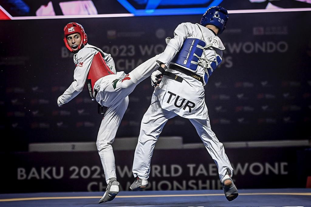 Navarro, left, lost to eventual men's under-63kg winner Hakan Reçber of Turkey, right ©World Taekwondo