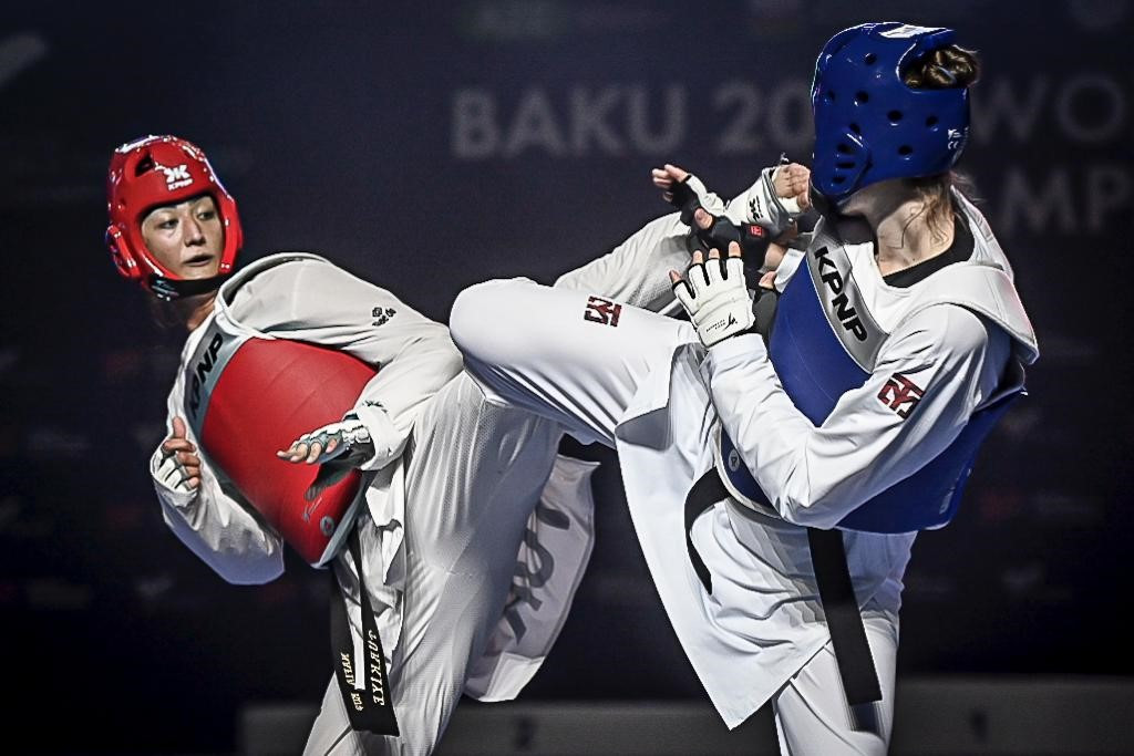 Turkey's Nafia Kuş, left, won her first World Championships gold after two previous bronze medals ©World Taekwondo
