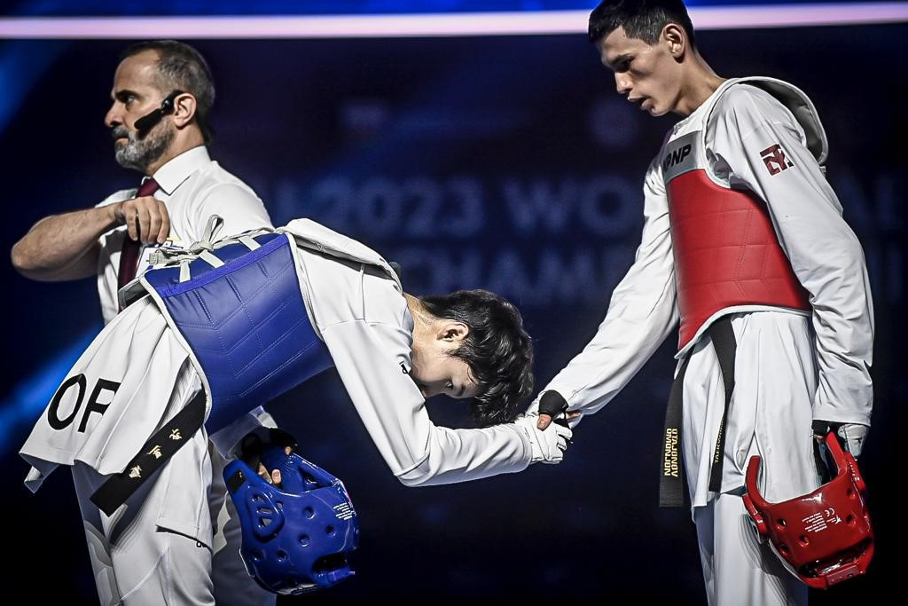 The semi-final victory for Park, left, was the only one which required three rounds against Uzbekistan's Omonjon Otajonov, right ©World Taekwondo