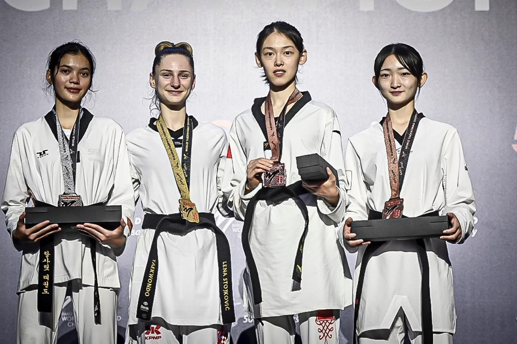 Croatia's Lena Stojković, second left, finished on top of the women's under-46kg podium for the second consecutive World Taekwondo Championships ©World Taekwondo