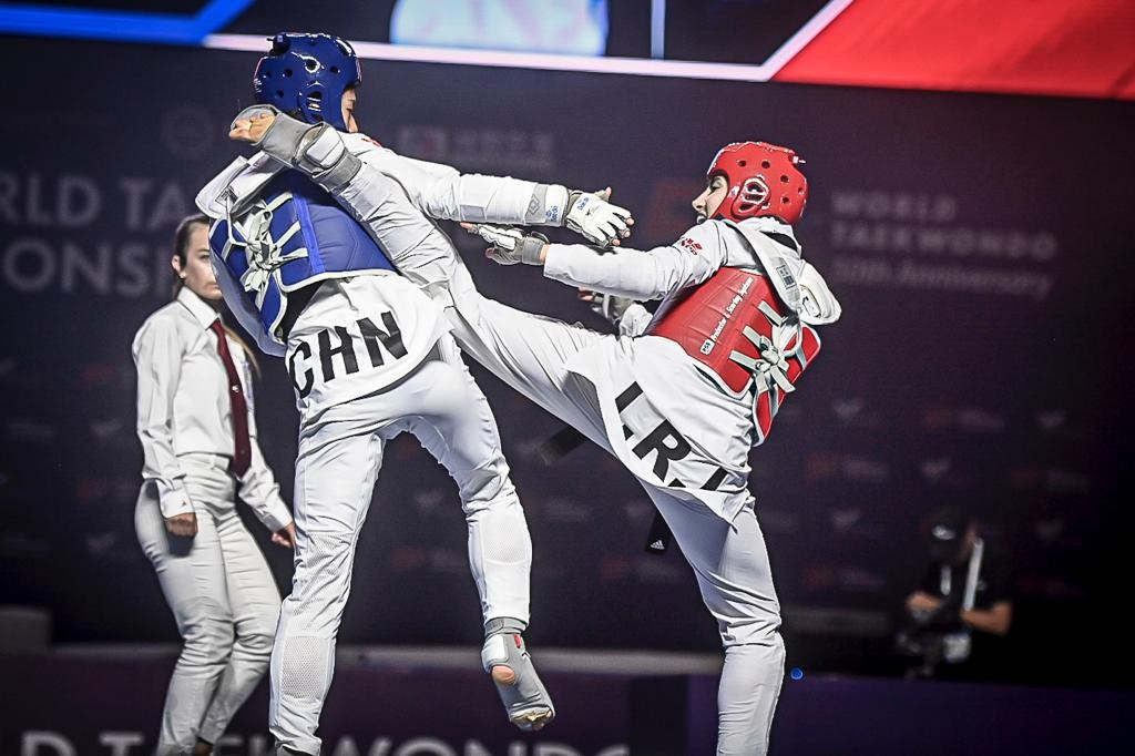 Iran's Nahid Kiyanichandeh, right, forced Zuo Ju of China, left, to settle for women's under-53kg silver for the second year running ©World Taekwondo