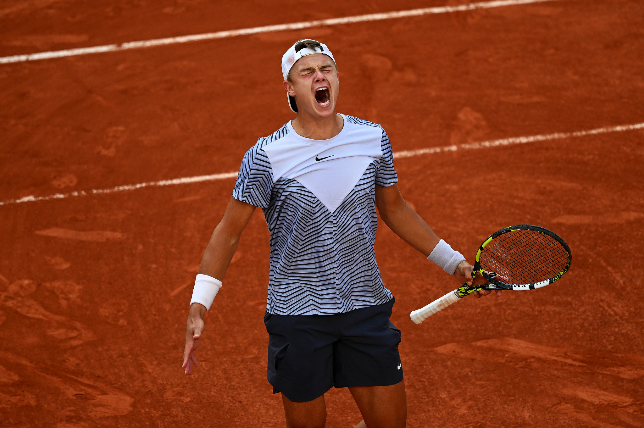 Rune wins four-hour thriller to seal place in French Open quarter-finals