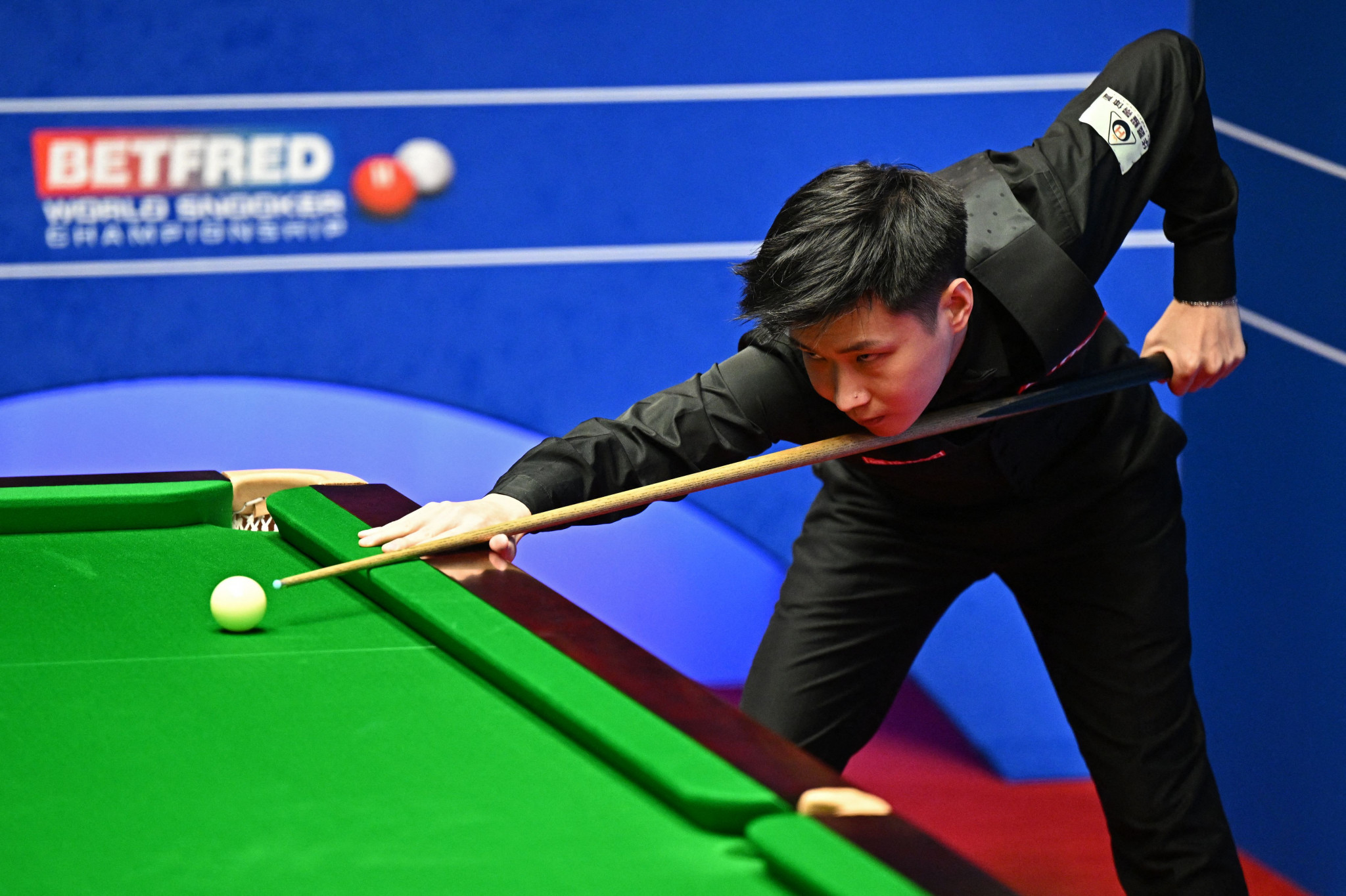 Zhao Xintong, who won the 2021 UK Championship has been banned in connection with fixing and betting on matches ©Getty Images