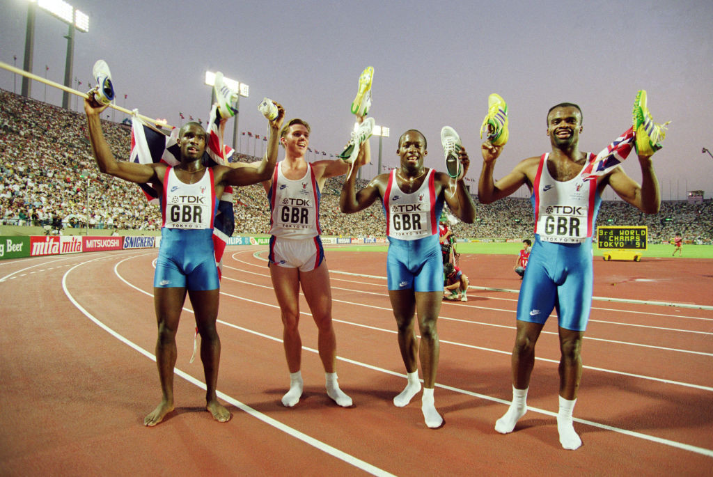 Team spirit helped Britain defeat defending champions United States to win the 1991 world 4x400m title in Tokyo - celebrating, from left: Derek Redmond, Roger Black, John Regis and Kriss Akabusi ©Getty Images