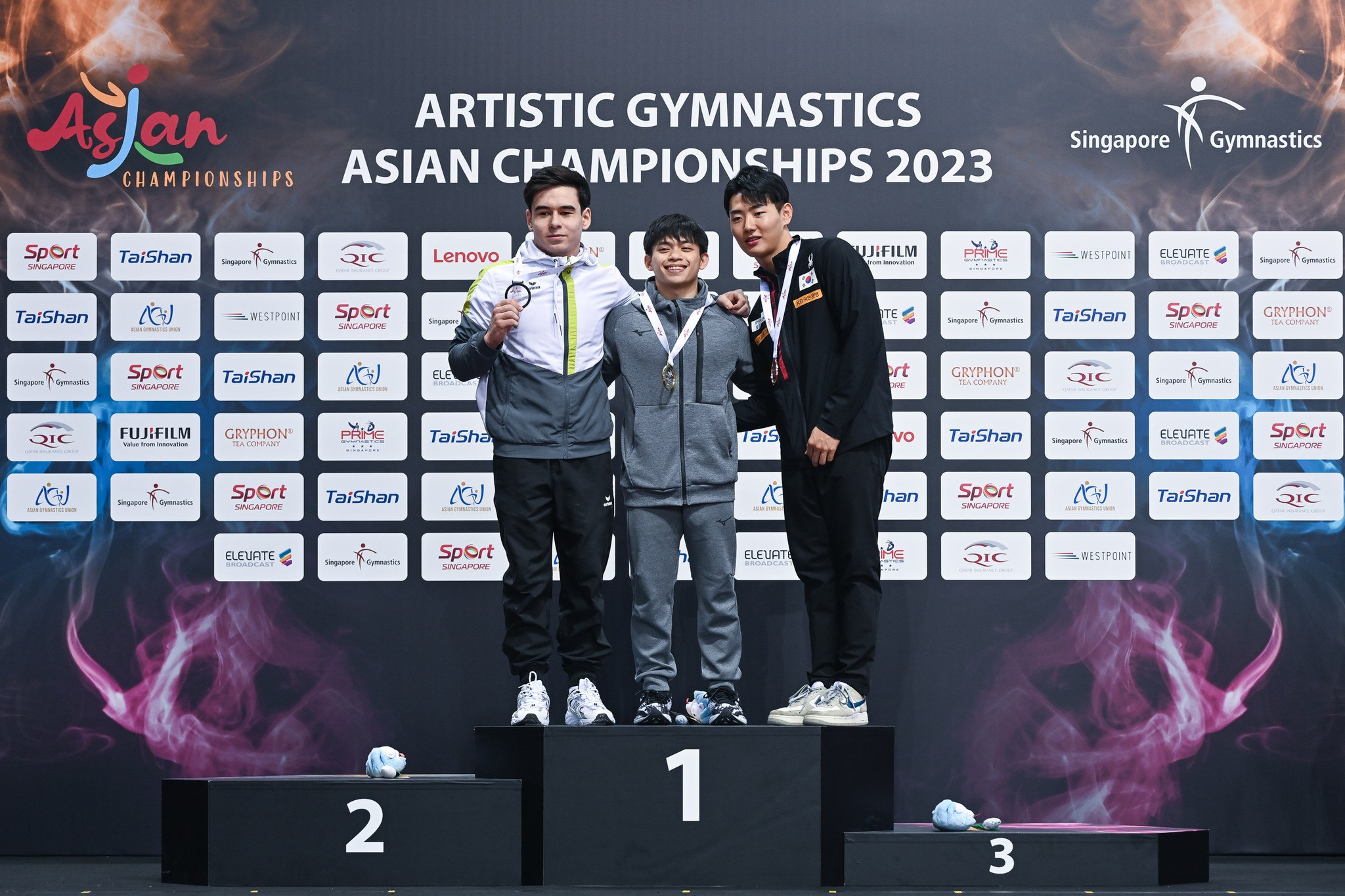 Carlos Yulo, centre, claimed three titles in total at the Asian Artistic Gymnastics Championships ©Singapore Gymnastics