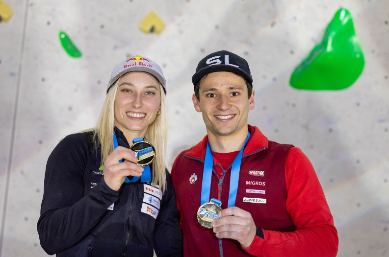 Janja Garnbret, left, of Slovenia and ascha Lehmann of Switzerland, right, captured the respective women's and men's lead golds ©IFSC