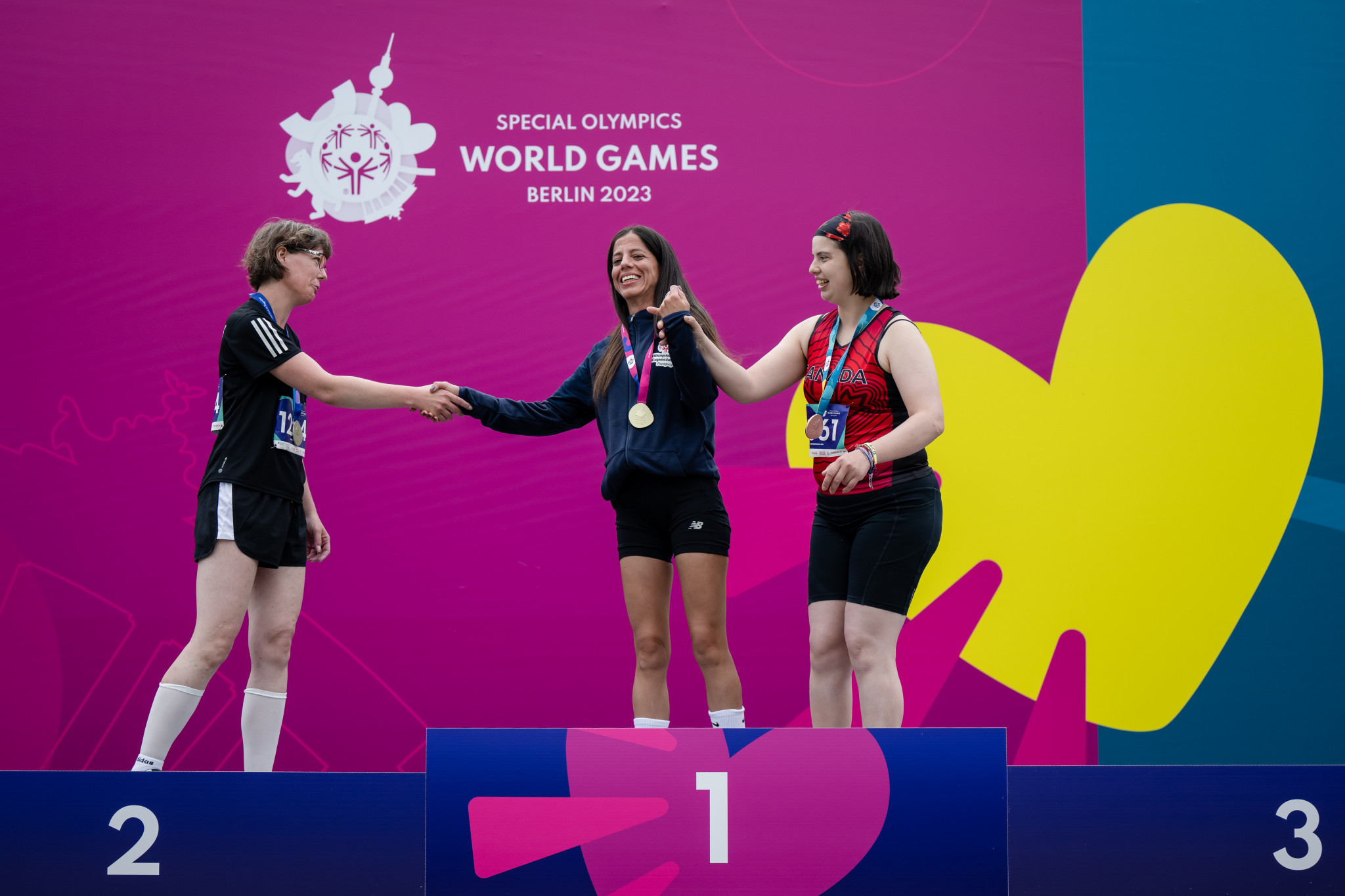 Paraguay's Monica Prieto, centre, was among the first athletics gold medallists in the 5,000m ©Special Olympics World Games Berlin 2023