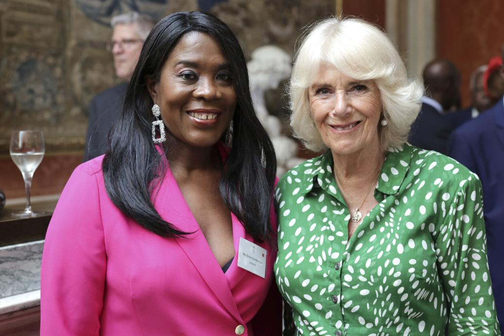 Britain's Queen Camilla, right, poses for a picture with Olympic gold medallist Tessa Sanderson during a reception to mark the 75th anniversary of the arrival of Empire Windrush, at Buckingham Palace in London ©Getty Images