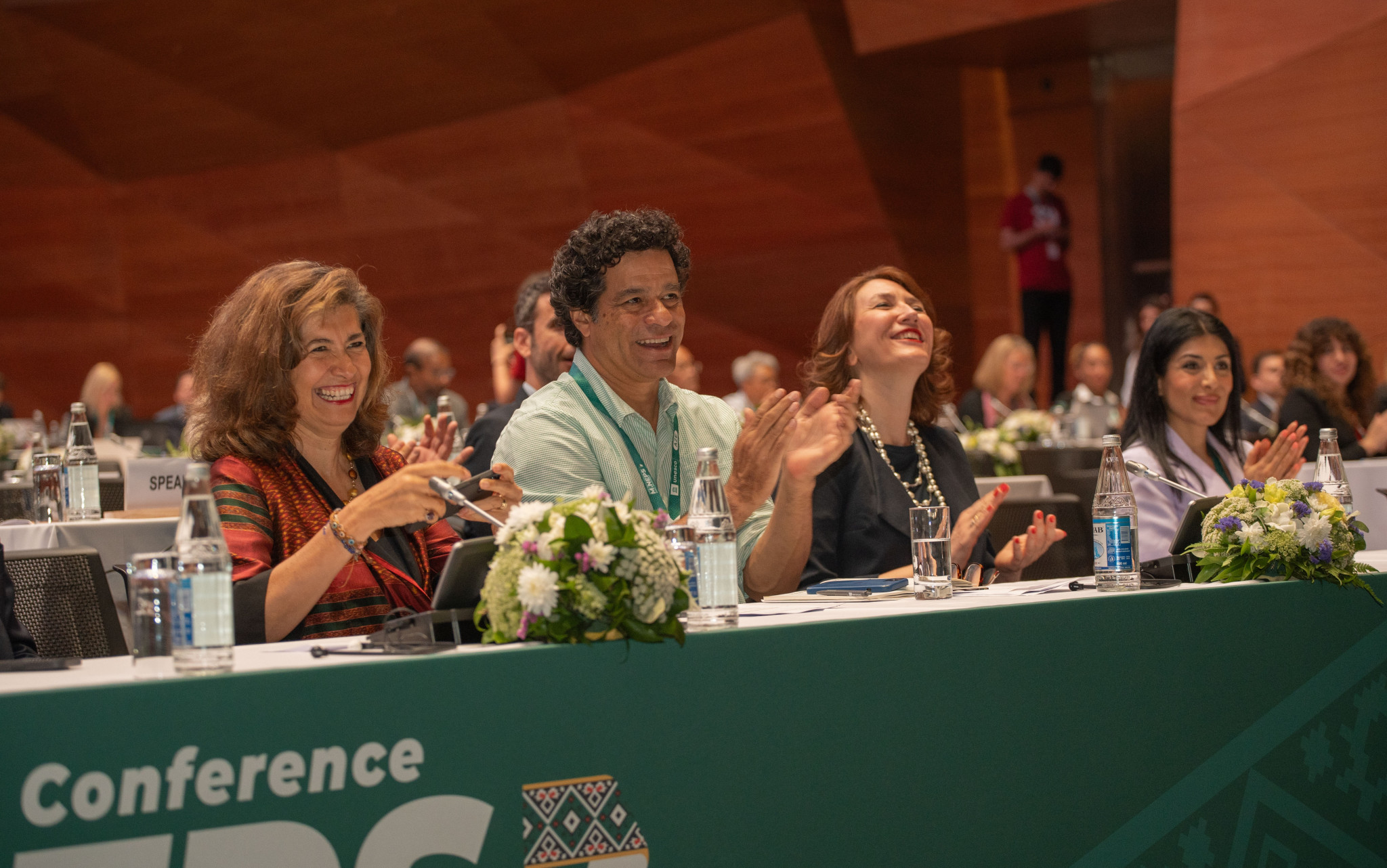 Delegates enjoy the performers on stage at the Baku Convention Center ©Baku 2023