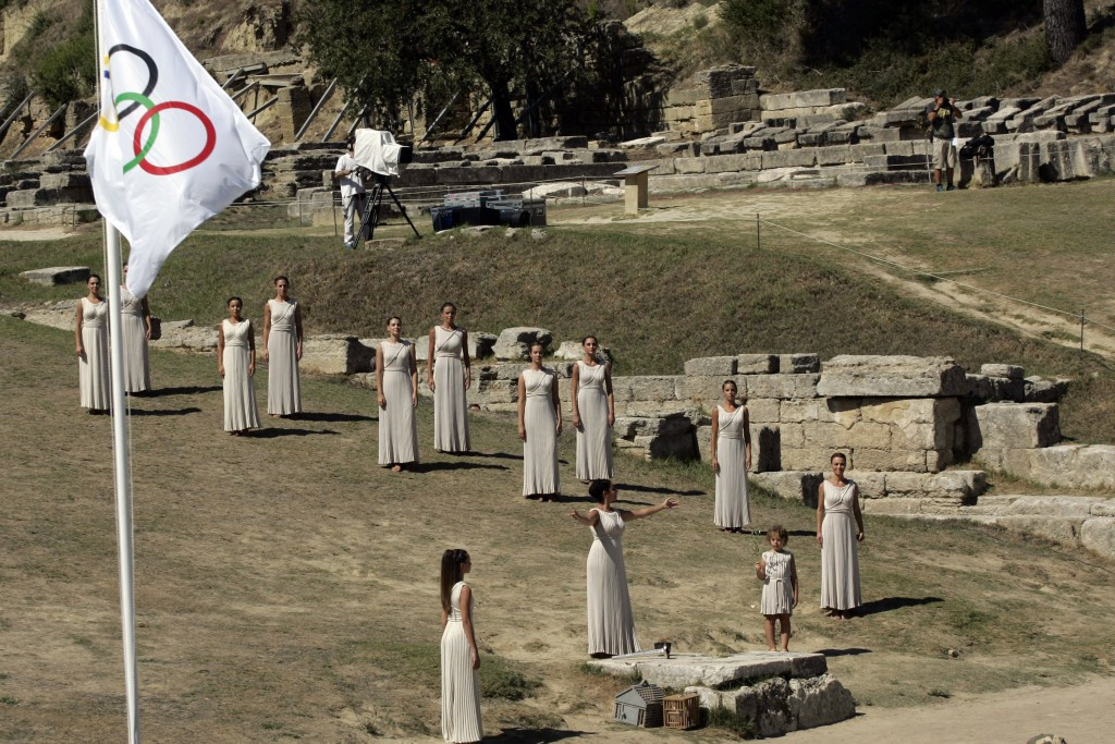 The Sochi 2014 Olympic Flame being lit by the rays of the sun in the Temple of Hera ©Getty Images