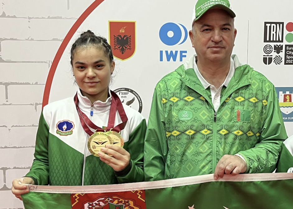 Turkmenistan's Gurbandurdy Amanov, right, is the country's national youth champion and coaches his three daughters, two of whom have now tested positive for performance-enhancing drugs ©ITG