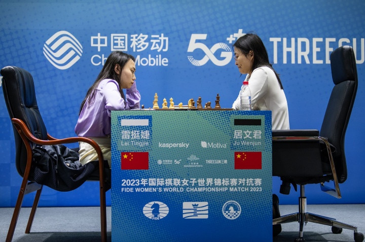 Ju Wenjun, right, let Lei Tingjie off the hook in the middlegame as the third match of the FIDE Women's World Championship Match ended in a draw ©FIDE