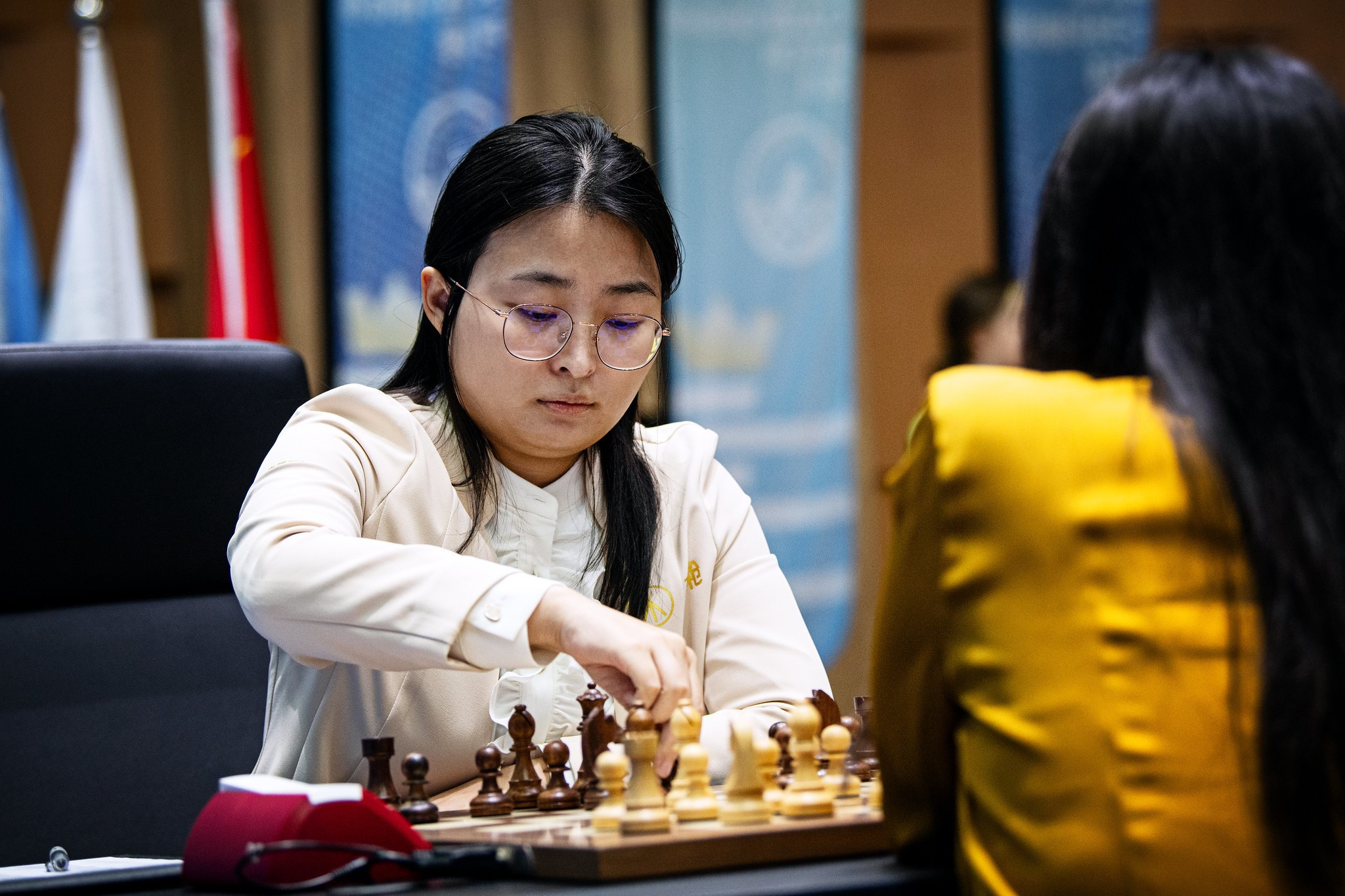 Ju Wenjun spent more than 20 minutes thinking about how to react to what proved to be the decisive move from Lei Tingjie as she won game five ©FIDE/Stev Bonhage