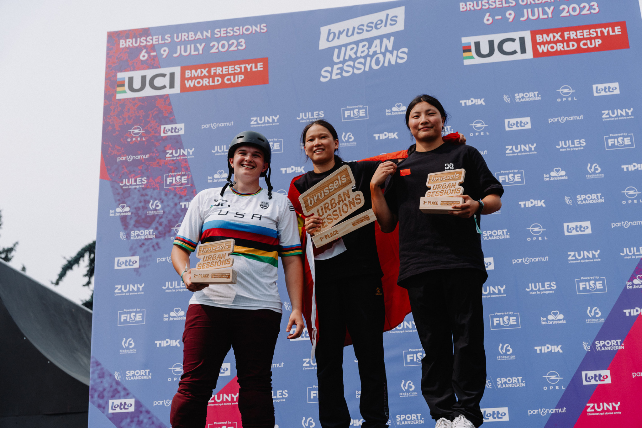 Huimin Zhou, centre, of China won the Brussels stop of the BMX Freestyle World Cup circuit, in the women's park event ©UCI