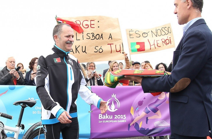 Jorge Cristóvão was given the Portuguese flag by the Portuguese Olympic Committee's Chef de Mission, José Garcia