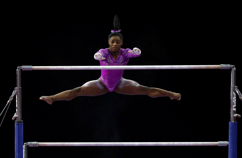 Biles marks return with all-around gold at Pacific Rim Championships