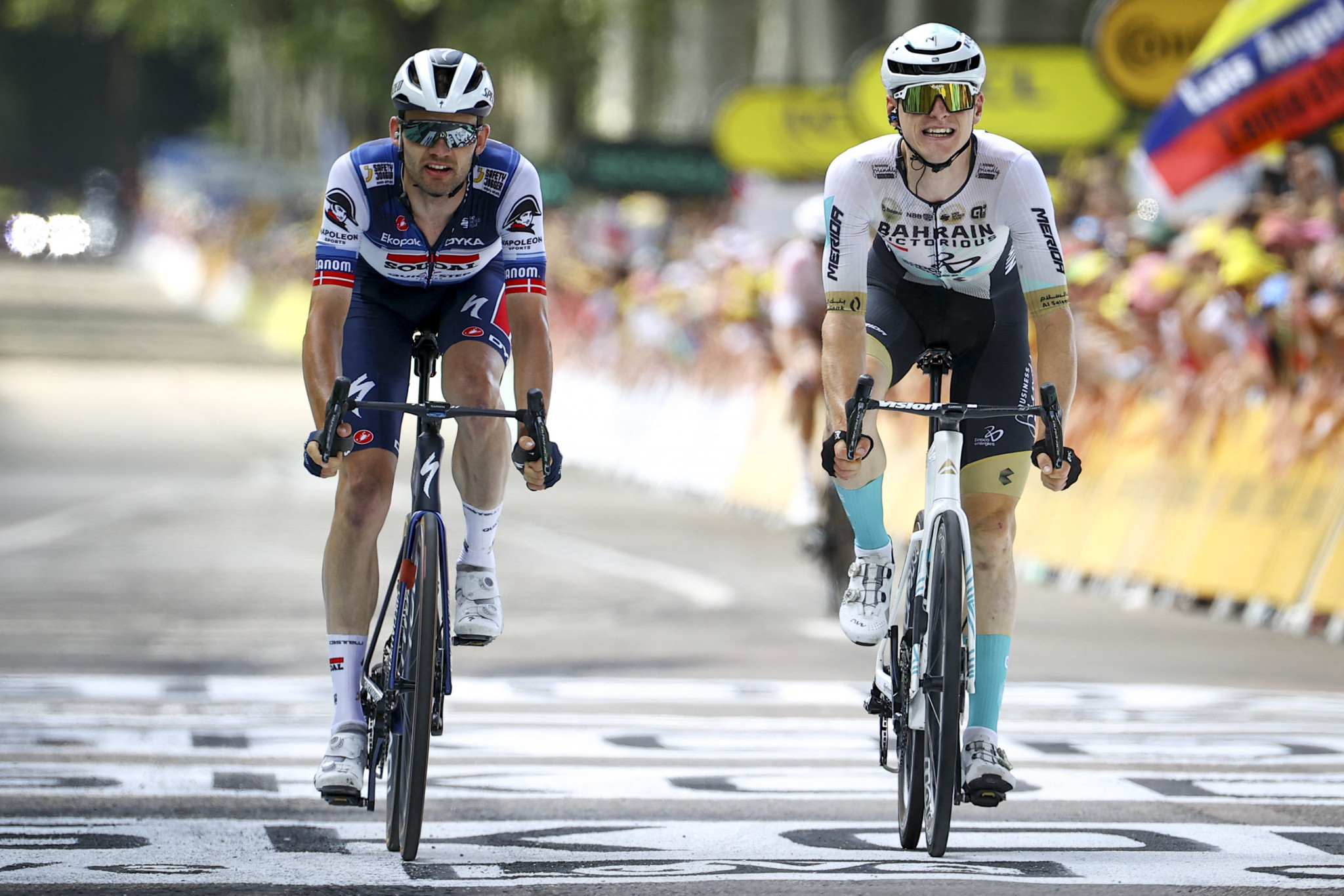 Slovenia's Matej Mohorič, right, narrowly beat Denmark's Kasper Asgreen, left, to win stage 19 on the Tour de France ©Getty Images