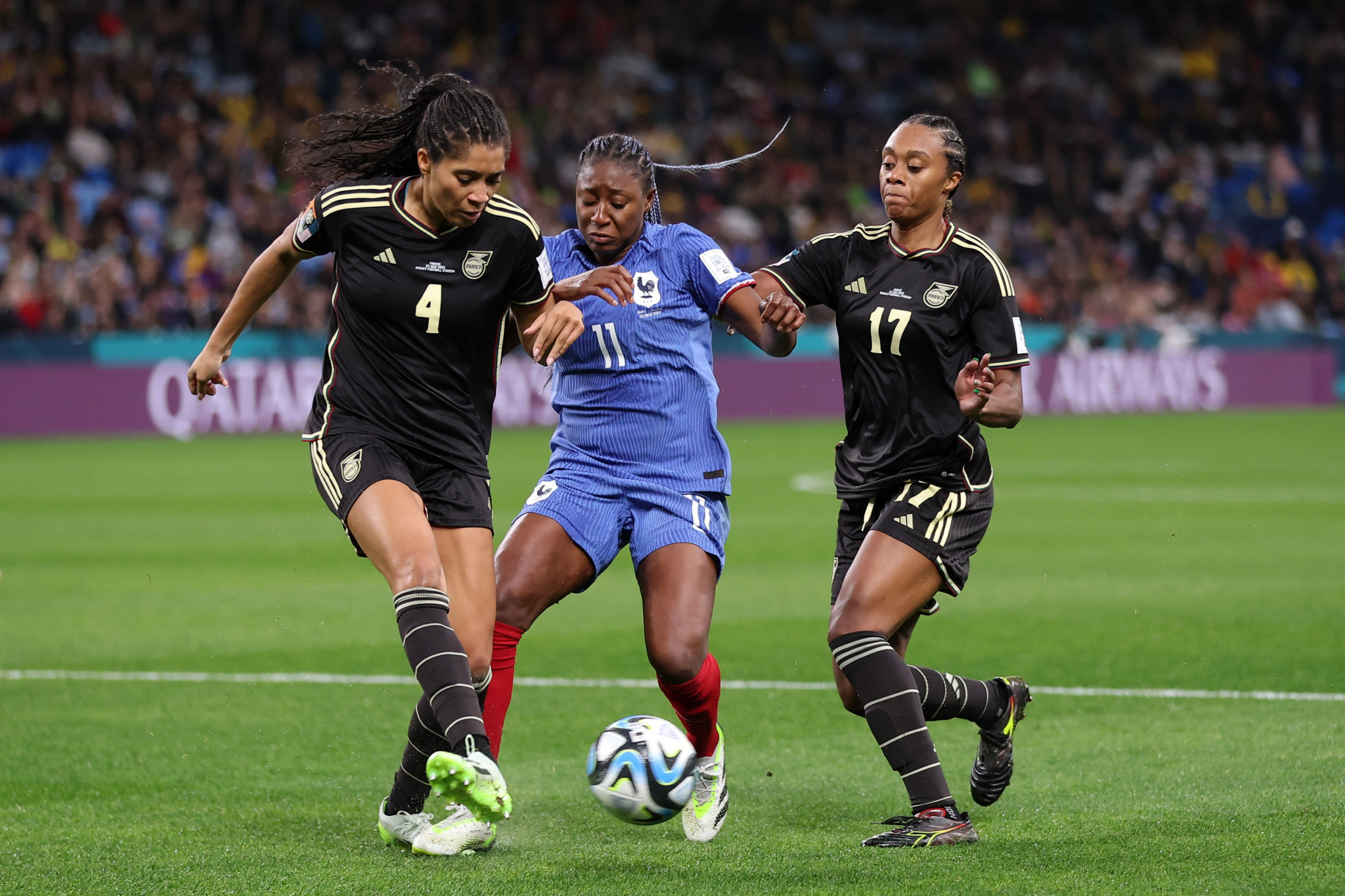 Kadidiatou Diani, centre, battles for the ball on a frustrating day for France as they had to settle for a share of the points against Jamaica ©Getty Images